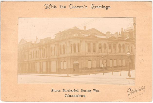 used as a Christmas card showing Johannesburg Stock Exchange Simmonds Street (east end)
from Commissioner Street durimg the South African War